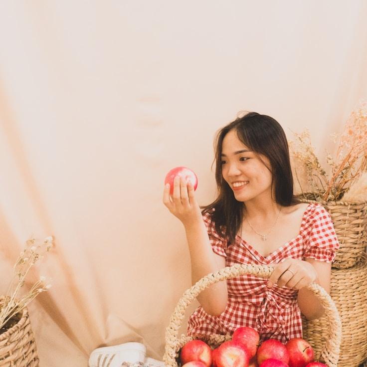 Aarohi Singh, Lead Design Curator at Orchid Valley Pulse, reviewing corporate floral arrangements